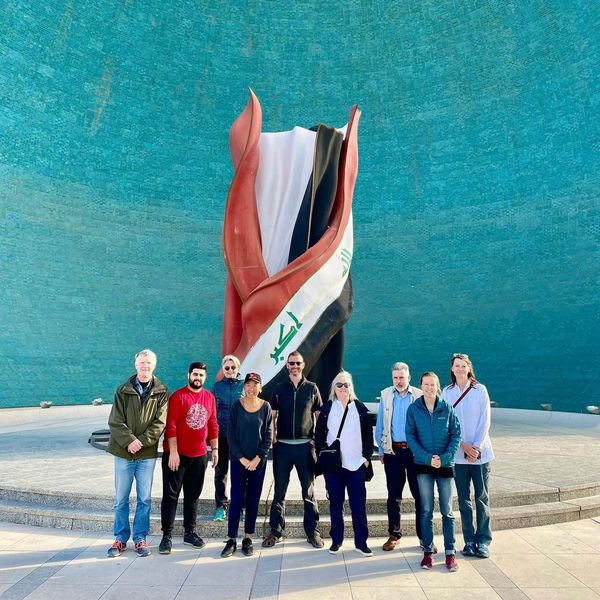 Group of Multi-National Tourists in the Martyr Monument in Baghdad.