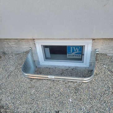 New basement window with window well