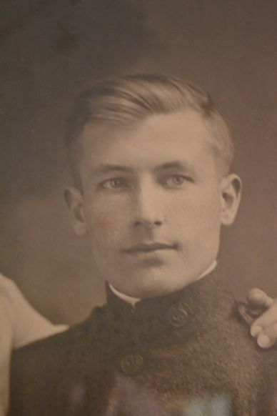 Vintage portrait of a young man in uniform.