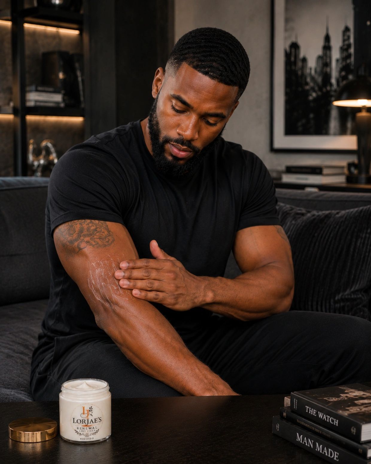Man applying lotion to his arm indoors.