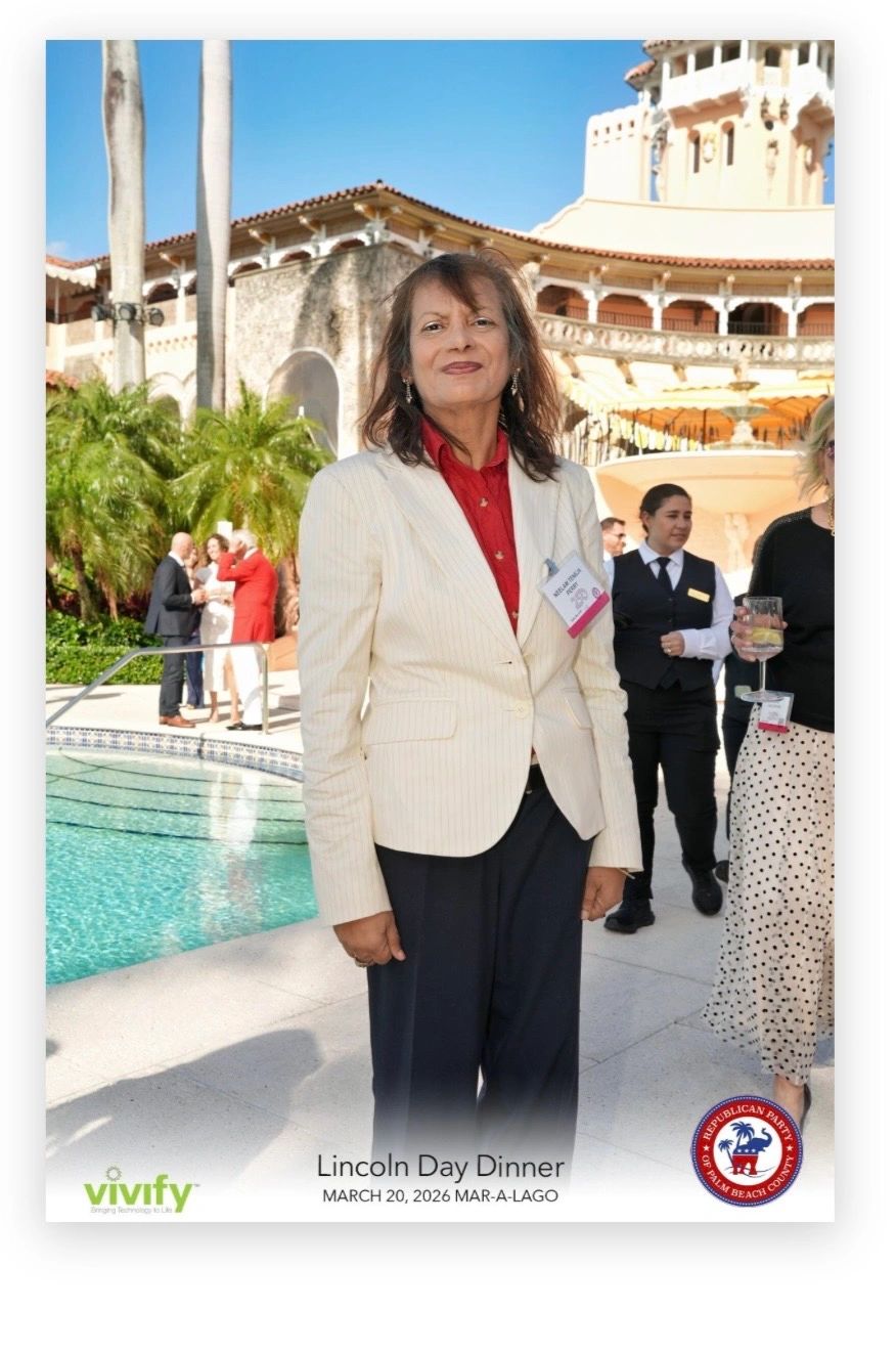 Woman in white blazer at Lincoln Day Dinner by the pool at Mar-a-Lago.