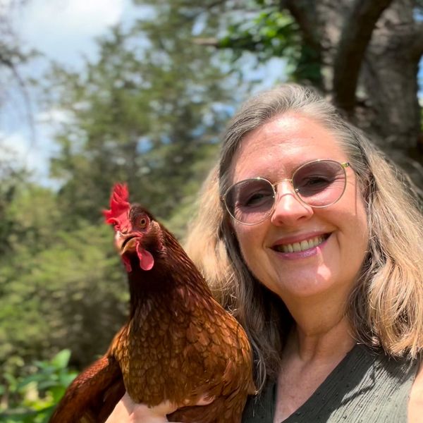 Me and my favorite chicken Tender! She was feisty and such an amazing cuddler.