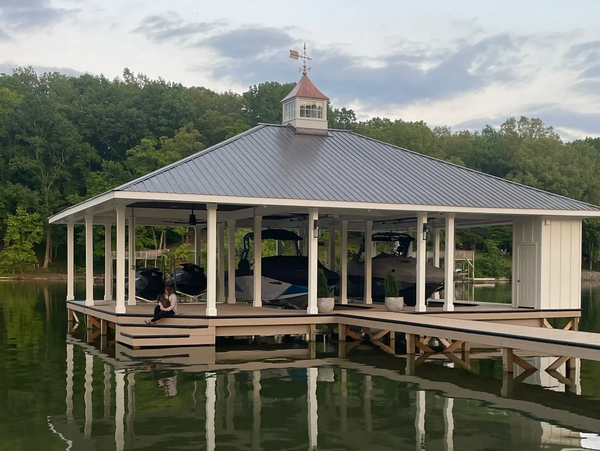 Beautiful Stationary Dock with boat lifts and PWC lift