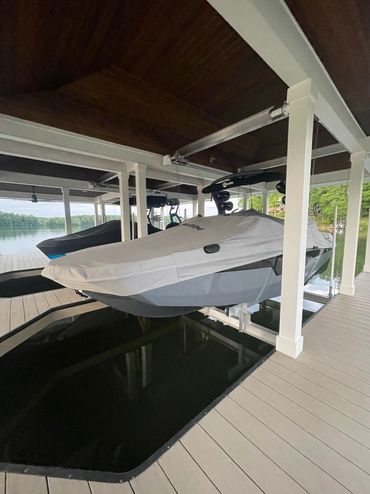 Beautiful Aluminum Boat Lifts in custom dock by Tennessee Dock Masters