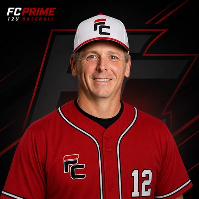 Baseball coach in red FC Prime uniform with cap, smiling.