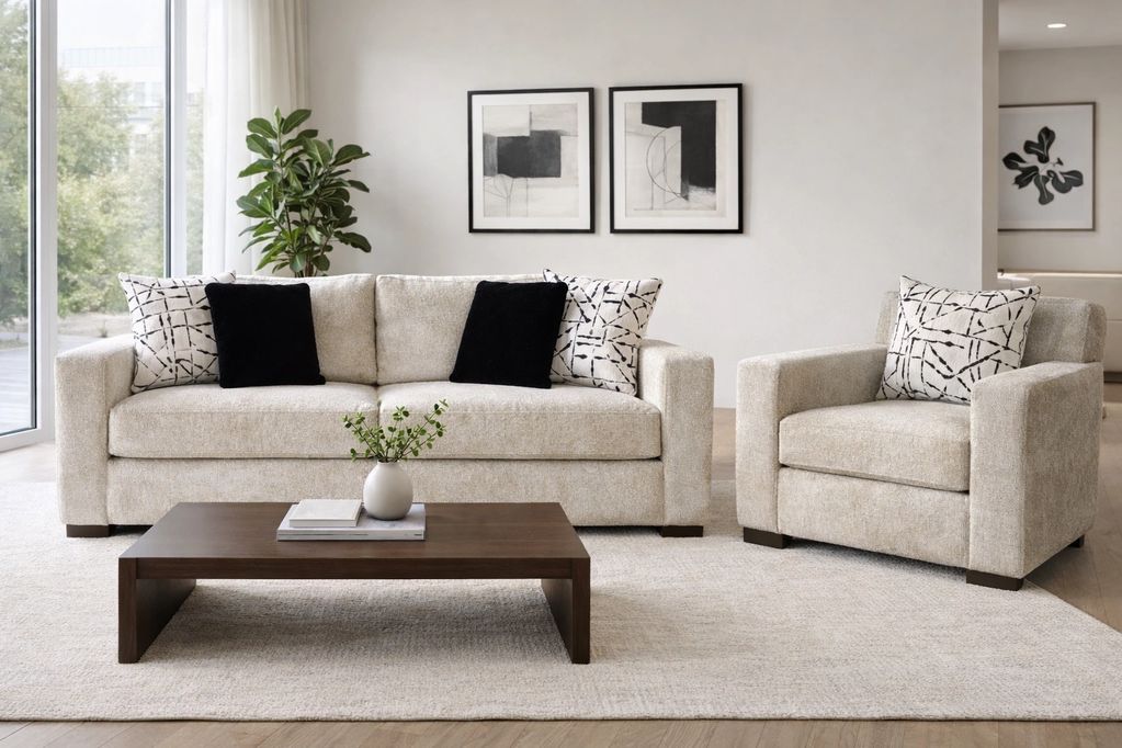 Modern living room with beige sofa set, abstract art, and wooden coffee table.