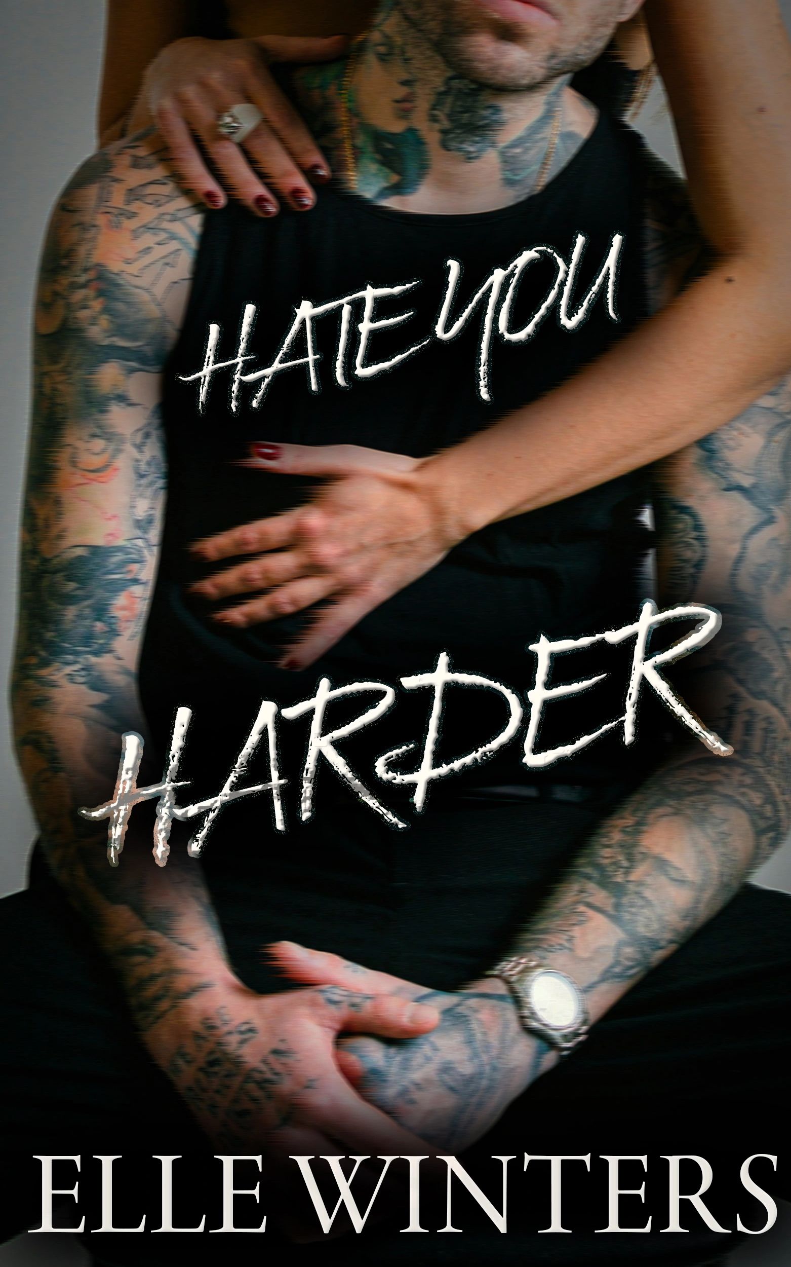 Tattoed man embraced with the words 'Hate You Harder' and author Elle Winters' name.