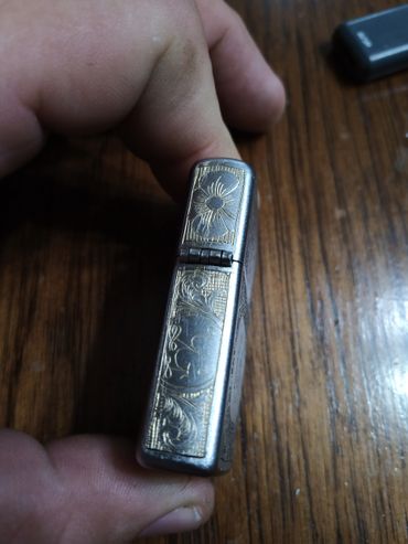 Hand-engraved Zippo with scrollwork and monogram 