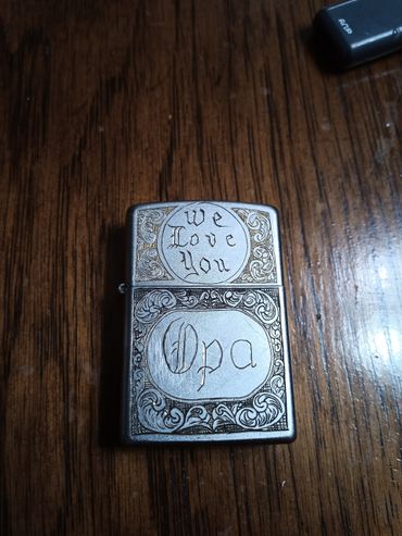 Hand-engraved Zippo with scrollwork and monogram 