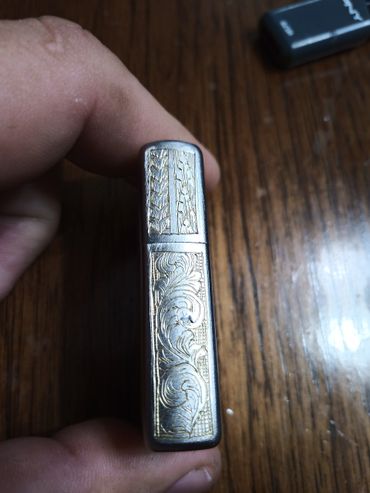 Hand-engraved Zippo with scrollwork 