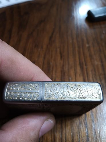 Hand-engraved Zippo with scrollwork