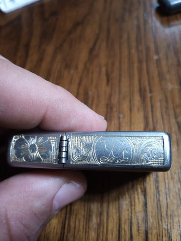 Hand-engraved Zippo with scrollwork and monogram 