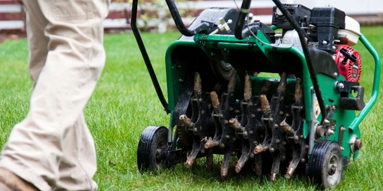 Lawn Care Professional Providing Lawn Aeration Service in Fayetteville, NC