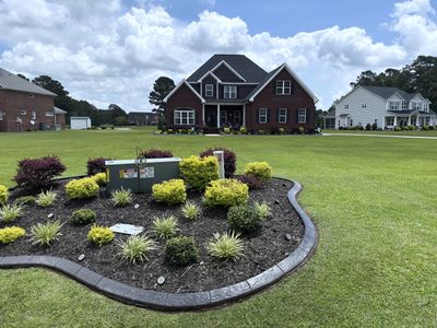 Mulched Garden Bed in Falcon, NC by Pretty City Lawns Lawn Care