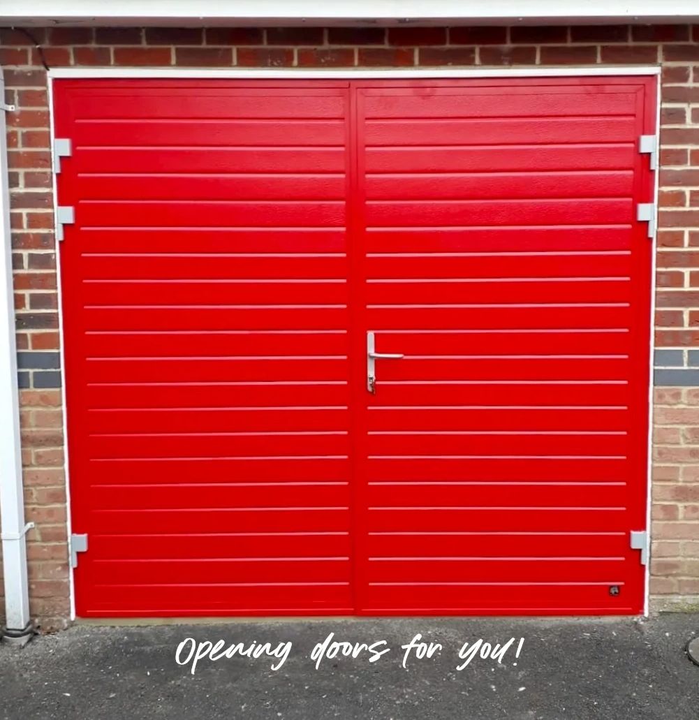 Insulated Side-hinged garage door in Red by 247 Garage Doors