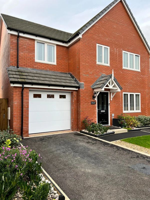 Garage Doors in Exeter; sectional door with windows