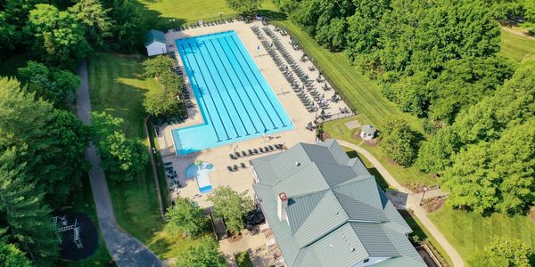 Aerial view of the Olympic-size saltwater community pool and clubhouse at McKay’s Mill in Franklin, Tennessee
