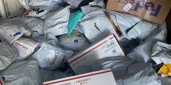 Image of a variety of unclaimed mail packages