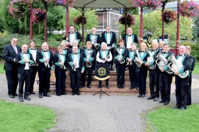 East Woodhay Silver Band playing a music concert in the park, Newbury. 