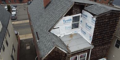 View of a house roof under construction or repair.
