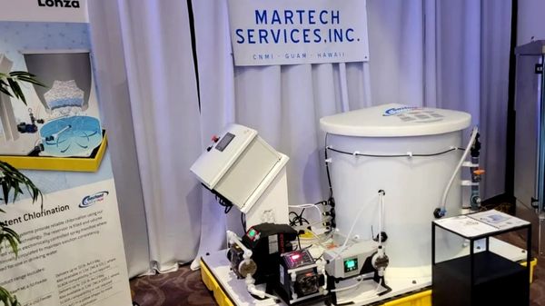 Water treatment system displayed by Martech Services, Inc. at an exhibition.