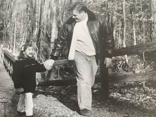 Claire Fishpaw walking with her father, Jon Fishpaw