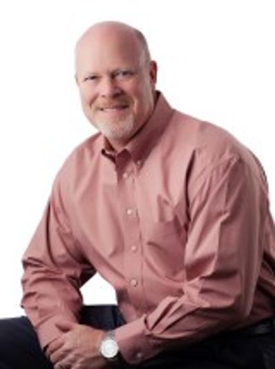 A man, Carey Berger, sitting facing the camera.