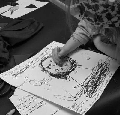 Story-Book Therapy is an empowered child-designed Superhero called "Potato Face."