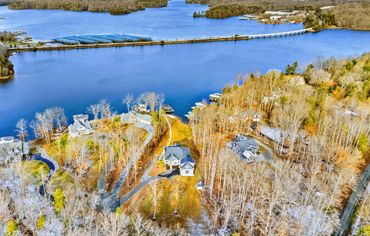 Aerial drone view of a Lake Anna waterfront custom home lot and surrounding landscape.