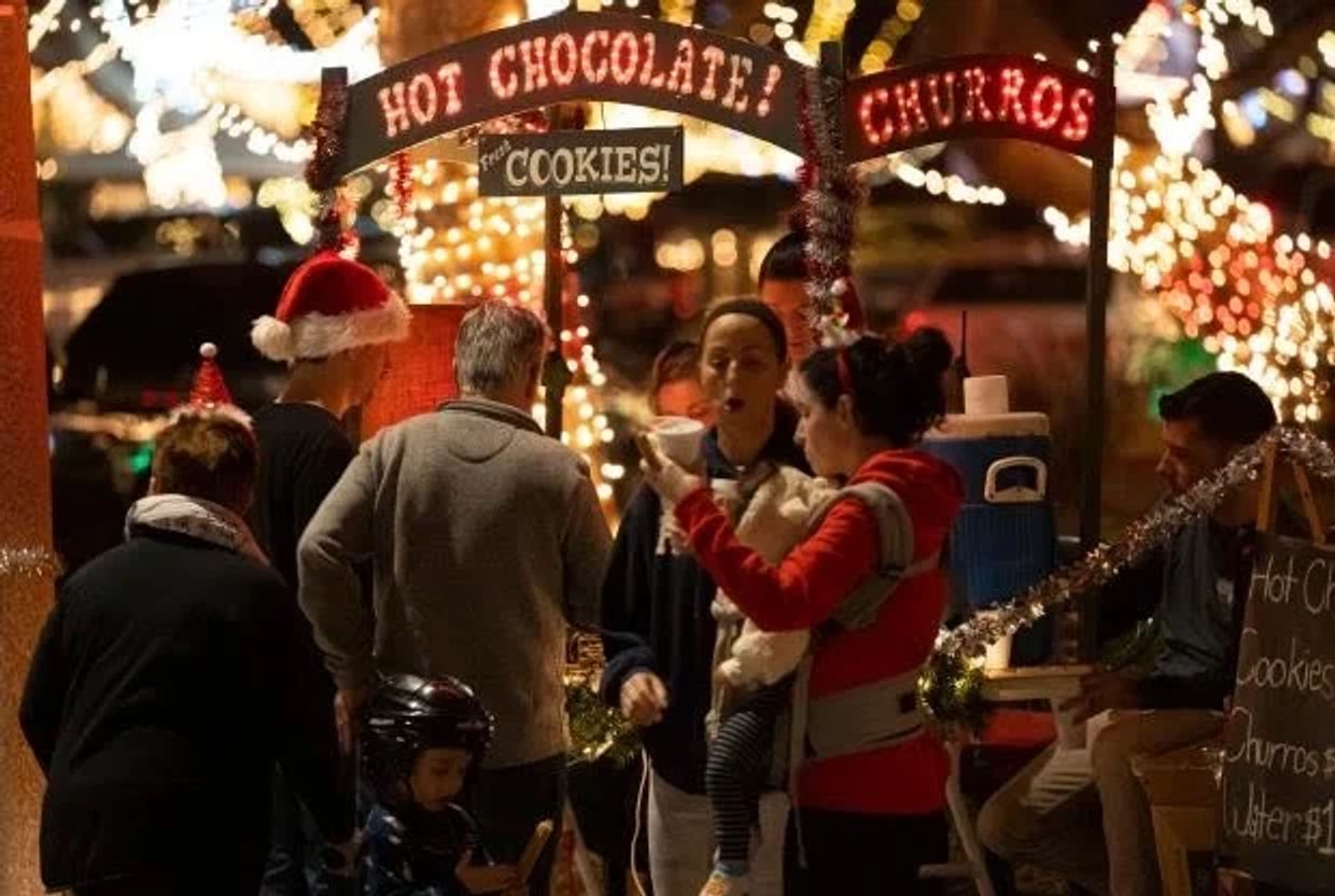 Seaside Resident selling hot chocolate and churros
