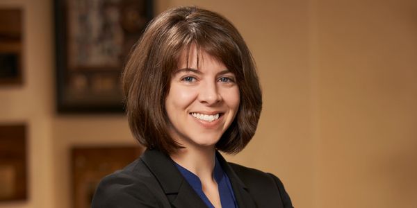 A photograph of Ann B. Smith attorney at law.