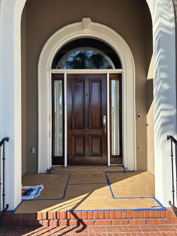 Stained door refinished. 