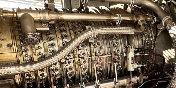 Image of a TM2500 worked on by HydraChem Technicians. Turbine lube oil system. oil maintenance