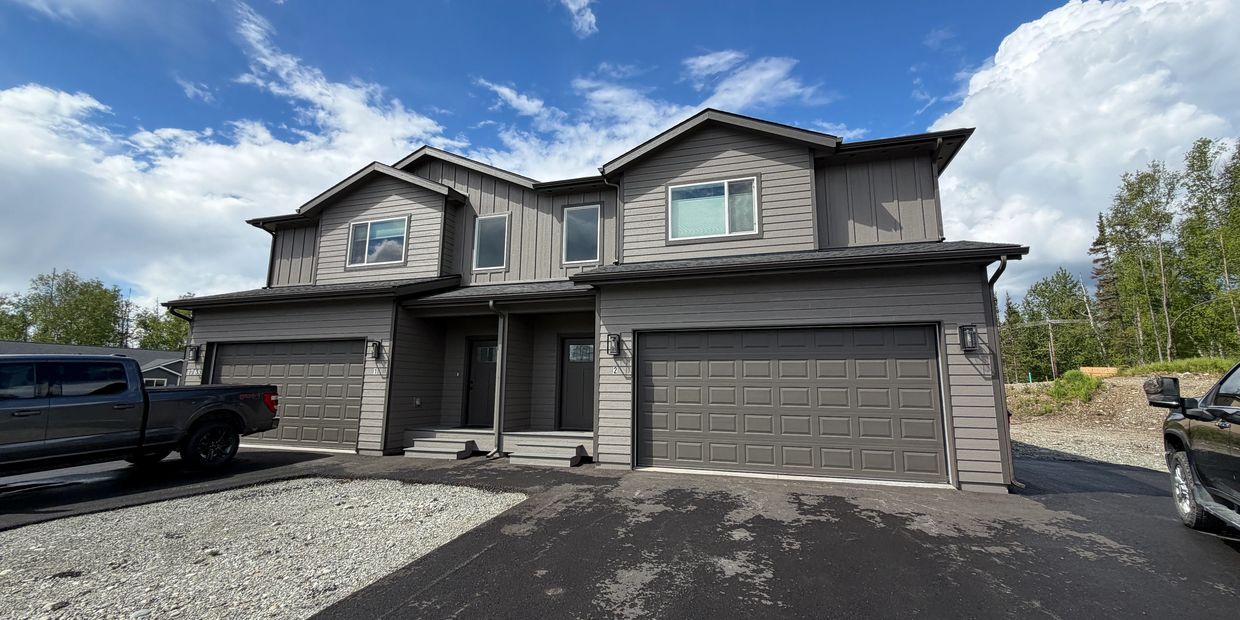 Color matching seamless gutters installed on Palmer Alaska home. 