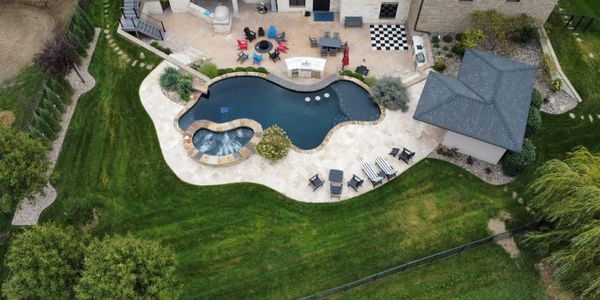 Family enjoying a newly built custom swimming pool.
