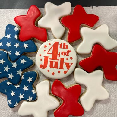 Patriotic 4th of July cookies in red, white, and blue with stars.