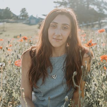 Young woman in a field of flowers.