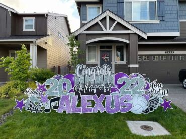 Decorative sign celebrating Alexus's 2022 achievement.