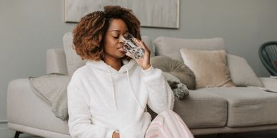 Woman enjoying a water fast in her private room