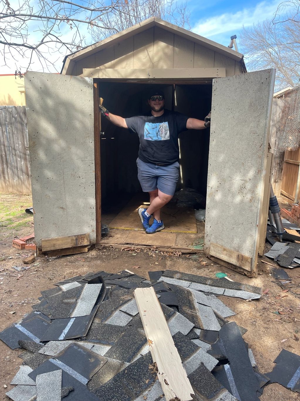 Pre demolition of a pre-fabricated shed.