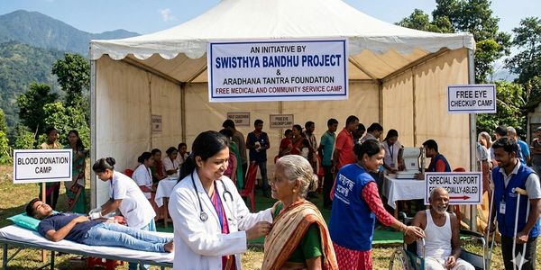 Medical and community service camp by Swisthya Bandhu Project in a rural area.