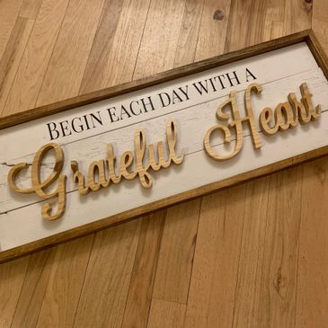 Wall art created with personalized options. Locally sourced and reclaimed materials are given a seco