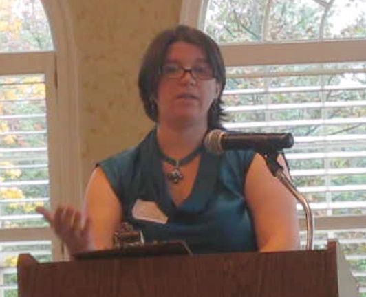 Melanie R. Cameron delivering a talk at the Women's Wedding Network