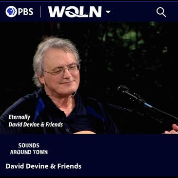 David Devine performing one of many of his original songs at the WQLN pavalion. 