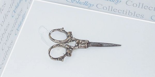 pair of small antique sewing scissors circa 1850