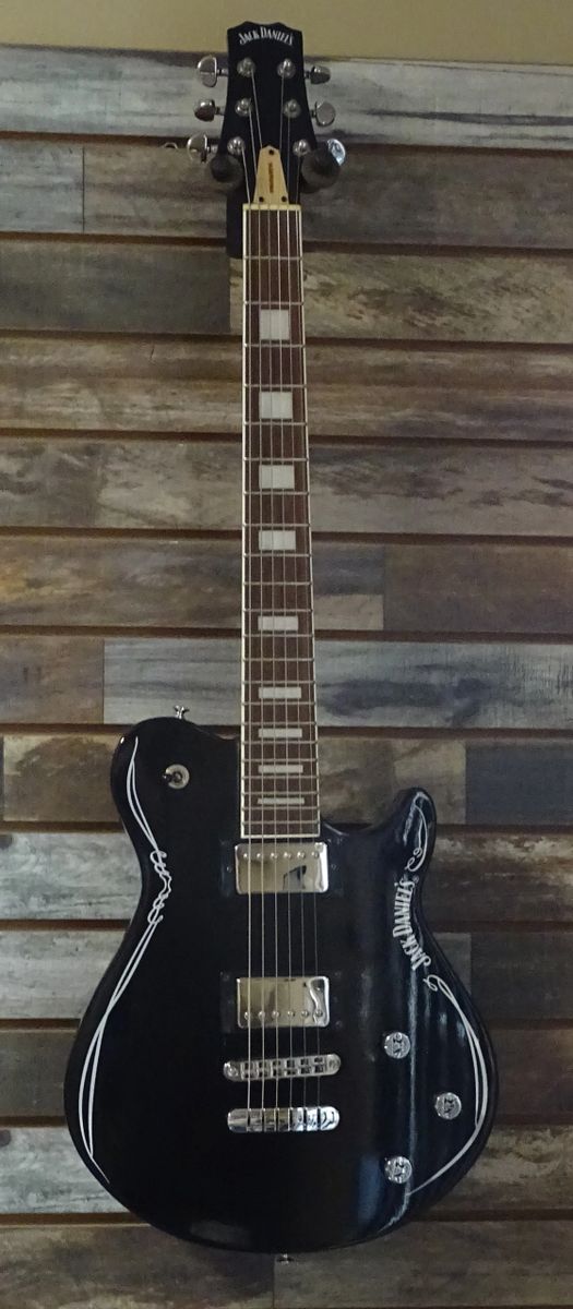 Peavey/Jack Daniel's Electric Guitar. New Old Stock. Includes Peavey Gig  Bag.