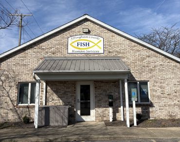 Brick building of Effingham County Fish Human Services with a clear blue sky.