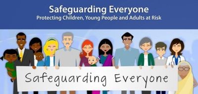 community members holding a sign saying safeguarding everyone