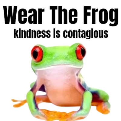 A vibrant green frog with big red eyes and orange toes.