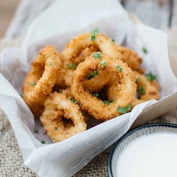One of the most classic appetizers made of lightly battered rings of squid quickly fried and served 